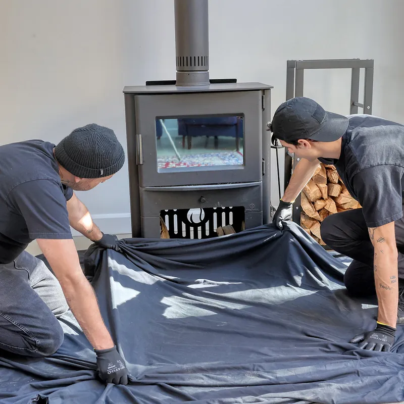 Protection de l’espace de travail avec bâches et aspirateur HEPA